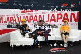 (L to R): Lando Norris (GBR) McLaren; Max Verstappen (NLD) Red Bull Racing; and Oscar Piastri (AUS) McLaren, in the post race FIA Press Conference. 24.09.2023. Formula 1 World Championship, Rd 17, Japanese Grand Prix, Suzuka, Japan, Race Day.