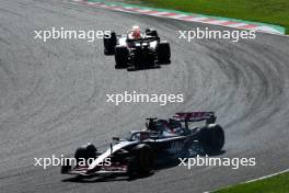 Kevin Magnussen (DEN) Haas VF-23 is hit by Sergio Perez (MEX) Red Bull Racing RB19. 24.09.2023. Formula 1 World Championship, Rd 17, Japanese Grand Prix, Suzuka, Japan, Race Day.