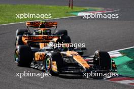 Oscar Piastri (AUS) McLaren MCL60 leads team mate Lando Norris (GBR) McLaren MCL60. 24.09.2023. Formula 1 World Championship, Rd 17, Japanese Grand Prix, Suzuka, Japan, Race Day.
