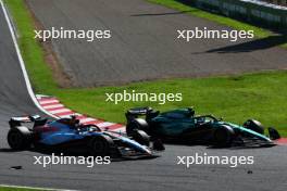 Alexander Albon (THA) Williams Racing FW45 and Fernando Alonso (ESP) Aston Martin F1 Team AMR23. 24.09.2023. Formula 1 World Championship, Rd 17, Japanese Grand Prix, Suzuka, Japan, Race Day.