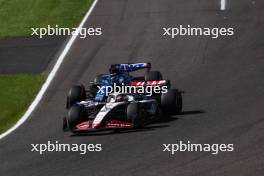 Kevin Magnussen (DEN) Haas VF-23 and Esteban Ocon (FRA) Alpine F1 Team A523 battle for position. 24.09.2023. Formula 1 World Championship, Rd 17, Japanese Grand Prix, Suzuka, Japan, Race Day.