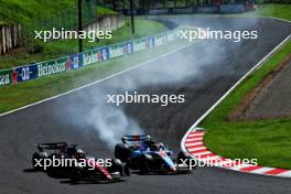 (L to R): Valtteri Bottas (FIN) Alfa Romeo F1 Team C43 and Logan Sargeant (USA) Williams Racing FW45 battle for position. 24.09.2023. Formula 1 World Championship, Rd 17, Japanese Grand Prix, Suzuka, Japan, Race Day.