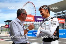 (L to R): Stefano Domenicali (ITA) Formula One President and CEO with Alexander Albon (THA) Williams Racing. 23.09.2023. Formula 1 World Championship, Rd 17, Japanese Grand Prix, Suzuka, Japan, Qualifying Day.