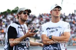 Sebastian Vettel (GER) and Mick Schumacher (GER)  23.09.2023. Formula 1 World Championship, Rd 17, Japanese Grand Prix, Suzuka, Japan, Qualifying Day.