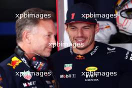 Max Verstappen (NLD) Red Bull Racing (Centre) with Christian Horner (GBR) Red Bull Racing Team Principal (Left). 23.09.2023. Formula 1 World Championship, Rd 17, Japanese Grand Prix, Suzuka, Japan, Qualifying Day.