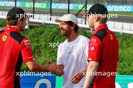 (L to R): Charles Leclerc (MON) Ferrari with Sebastian Vettel (GER) and Robert Shwartzman (RUS) / (ISR) Ferrari Reserve Driver. 21.09.2023. Formula 1 World Championship, Rd 17, Japanese Grand Prix, Suzuka, Japan, Preparation Day.