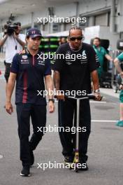 (L to R): Sergio Perez (MEX) Red Bull Racing with Lewis Hamilton (GBR) Mercedes AMG F1. 21.09.2023. Formula 1 World Championship, Rd 17, Japanese Grand Prix, Suzuka, Japan, Preparation Day.