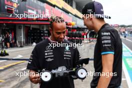 Esteban Ocon (FRA), Alpine F1 Team and Lewis Hamilton (GBR), Mercedes AMG F1  race with RC cars 21.09.2023. Formula 1 World Championship, Rd 17, Japanese Grand Prix, Suzuka, Japan, Preparation Day.