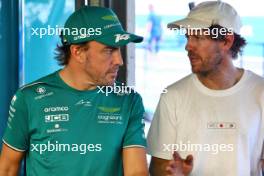 (L to R): Fernando Alonso (ESP) Aston Martin F1 Team with Sebastian Vettel (GER). 21.09.2023. Formula 1 World Championship, Rd 17, Japanese Grand Prix, Suzuka, Japan, Preparation Day.