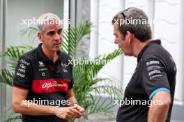 (L to R): Alessandro Alunni Bravi (ITA) Alfa Romeo F1 Team Managing Director and Team Representative with Bruno Famin (FRA) Alpine Motorsports Vice President. 21.09.2023. Formula 1 World Championship, Rd 17, Japanese Grand Prix, Suzuka, Japan, Preparation Day.