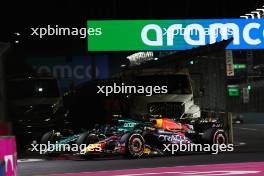 Fernando Alonso (ESP) Aston Martin F1 Team AMR23 and Sergio Perez (MEX) Red Bull Racing RB19 battle for position. 18.11.2023. Formula 1 World Championship, Rd 22, Las Vegas Grand Prix, Las Vegas, Nevada, USA, Race Day.