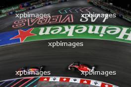 Max Verstappen (NLD) Red Bull Racing RB19 leads Charles Leclerc (MON) Ferrari SF-23. 18.11.2023. Formula 1 World Championship, Rd 22, Las Vegas Grand Prix, Las Vegas, Nevada, USA, Race Day.