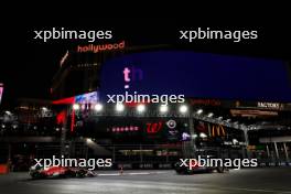 Max Verstappen (NLD) Red Bull Racing RB19 leads Charles Leclerc (MON) Ferrari SF-23. 18.11.2023. Formula 1 World Championship, Rd 22, Las Vegas Grand Prix, Las Vegas, Nevada, USA, Race Day.