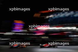 Charles Leclerc (MON) Ferrari SF-23 leads Max Verstappen (NLD) Red Bull Racing RB19. 18.11.2023. Formula 1 World Championship, Rd 22, Las Vegas Grand Prix, Las Vegas, Nevada, USA, Race Day.