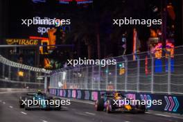 Fernando Alonso (ESP) Aston Martin F1 Team AMR23 and Max Verstappen (NLD) Red Bull Racing RB19. 16.11.2023. Formula 1 World Championship, Rd 22, Las Vegas Grand Prix, Las Vegas, Nevada, USA, Practice Day.
