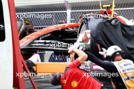 The Ferrari SF-23 of Carlos Sainz Jr (ESP) Ferrari is recovered back to the pits on the back of a truck, floor inspected by the team. 16.11.2023. Formula 1 World Championship, Rd 22, Las Vegas Grand Prix, Las Vegas, Nevada, USA, Practice Day.