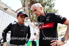 (L to R): Zhou Guanyu (CHN) Alfa Romeo F1 Team with Alessandro Alunni Bravi (ITA) Alfa Romeo F1 Team Managing Director and Team Representative on the grid. 28.05.2023. Formula 1 World Championship, Rd 7, Monaco Grand Prix, Monte Carlo, Monaco, Race Day.