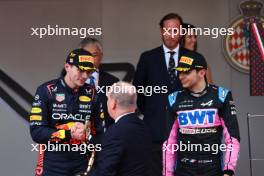 (L to R): Race winner Max Verstappen (NLD) Red Bull Racing celebrates with HSH Prince Albert of Monaco (MON) and Esteban Ocon (FRA) Alpine F1 Team on the podium. 28.05.2023. Formula 1 World Championship, Rd 7, Monaco Grand Prix, Monte Carlo, Monaco, Race Day.