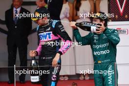 (L to R): Esteban Ocon (FRA) Alpine F1 Team celebrates his third position on the podium with second placed Fernando Alonso (ESP) Aston Martin F1 Team. 28.05.2023. Formula 1 World Championship, Rd 7, Monaco Grand Prix, Monte Carlo, Monaco, Race Day.