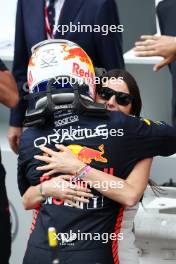 Race winner Max Verstappen (NLD) Red Bull Racing celebrates with Kelly Piquet (BRA) in parc ferme. 28.05.2023. Formula 1 World Championship, Rd 7, Monaco Grand Prix, Monte Carlo, Monaco, Race Day.