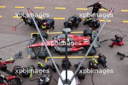 Zhou Guanyu (CHN) Alfa Romeo F1 Team C43 makes a pit stop. 28.05.2023. Formula 1 World Championship, Rd 7, Monaco Grand Prix, Monte Carlo, Monaco, Race Day.