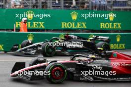 Zhou Guanyu (CHN) Alfa Romeo F1 Team C43 and Lewis Hamilton (GBR) Mercedes AMG F1 W14. 28.05.2023. Formula 1 World Championship, Rd 7, Monaco Grand Prix, Monte Carlo, Monaco, Race Day.