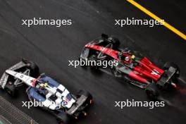Yuki Tsunoda (JPN) AlphaTauri AT04 and Zhou Guanyu (CHN) Alfa Romeo F1 Team C43. 28.05.2023. Formula 1 World Championship, Rd 7, Monaco Grand Prix, Monte Carlo, Monaco, Race Day.
