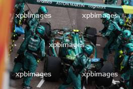 Fernando Alonso (ESP) Aston Martin F1 Team AMR23 makes a pit stop. 28.05.2023. Formula 1 World Championship, Rd 7, Monaco Grand Prix, Monte Carlo, Monaco, Race Day.