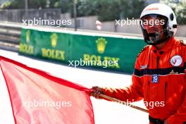 A marshal waves a red flag during qualifying. 27.05.2023. Formula 1 World Championship, Rd 7, Monaco Grand Prix, Monte Carlo, Monaco, Qualifying Day.