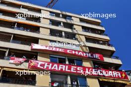 Circuit atmosphere - fans in apartments with a Charles Leclerc (MON) Ferrari banner. 27.05.2023. Formula 1 World Championship, Rd 7, Monaco Grand Prix, Monte Carlo, Monaco, Qualifying Day.