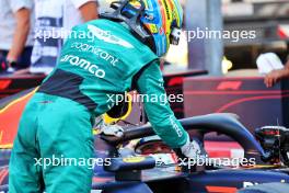 (L to R): second placed Fernando Alonso (ESP) Aston Martin F1 Team congratulates pole sitter Max Verstappen (NLD) Red Bull Racing RB19 in qualifying parc ferme. 27.05.2023. Formula 1 World Championship, Rd 7, Monaco Grand Prix, Monte Carlo, Monaco, Qualifying Day.