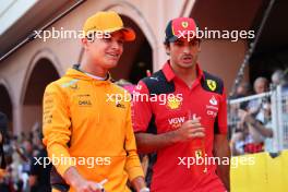 (L to R): Lando Norris (GBR) McLaren and Carlos Sainz Jr (ESP) Ferrari on the drivers' parade. 28.05.2023. Formula 1 World Championship, Rd 7, Monaco Grand Prix, Monte Carlo, Monaco, Race Day.