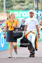 (L to R): Sophie Ogg (GBR) McLaren Communications Director with Lando Norris (GBR) McLaren. 25.05.2023. Formula 1 World Championship, Rd 7, Monaco Grand Prix, Monte Carlo, Monaco, Preparation Day.