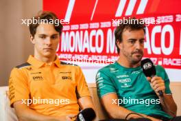 (L to R): Oscar Piastri (AUS) McLaren and Fernando Alonso (ESP) Aston Martin F1 Team in the FIA Press Conference. 25.05.2023. Formula 1 World Championship, Rd 7, Monaco Grand Prix, Monte Carlo, Monaco, Preparation Day.