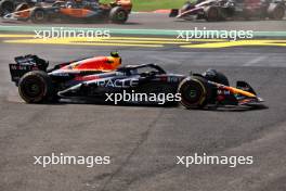 Sergio Perez (MEX) Red Bull Racing RB19 - crash at the start of the race. 29.10.2023. Formula 1 World Championship, Rd 20, Mexican Grand Prix, Mexico City, Mexico, Race Day.