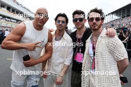Vin Diesel (USA) Actor with the Jonas Brothers on the grid. 07.05.2023. Formula 1 World Championship, Rd 5, Miami Grand Prix, Miami, Florida, USA, Race Day.