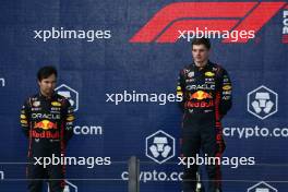 (L to R): Second placed Sergio Perez (MEX) Red Bull Racing and race winner Max Verstappen (NLD) Red Bull Racing on the podium. 07.05.2023. Formula 1 World Championship, Rd 5, Miami Grand Prix, Miami, Florida, USA, Race Day.