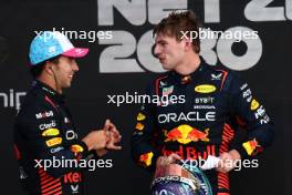 2nd place Sergio Perez (MEX) Red Bull Racing with 1st place Max Verstappen (NLD) Red Bull Racing. 07.05.2023. Formula 1 World Championship, Rd 5, Miami Grand Prix, Miami, Florida, USA, Race Day.