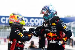 2nd place Sergio Perez (MEX) Red Bull Racing with 1st place Max Verstappen (NLD) Red Bull Racing. 07.05.2023. Formula 1 World Championship, Rd 5, Miami Grand Prix, Miami, Florida, USA, Race Day.