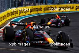 Max Verstappen (NLD) Red Bull Racing RB19 leads team mate Sergio Perez (MEX) Red Bull Racing RB19. 07.05.2023. Formula 1 World Championship, Rd 5, Miami Grand Prix, Miami, Florida, USA, Race Day.