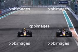Max Verstappen (NLD) Red Bull Racing RB19 passes team mate Sergio Perez (MEX) Red Bull Racing RB19 to take the lead of the race. 07.05.2023. Formula 1 World Championship, Rd 5, Miami Grand Prix, Miami, Florida, USA, Race Day.