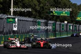 Nico Hulkenberg (GER) Haas VF-23 and Carlos Sainz Jr (ESP) Ferrari SF-23 battle for position. 07.05.2023. Formula 1 World Championship, Rd 5, Miami Grand Prix, Miami, Florida, USA, Race Day.