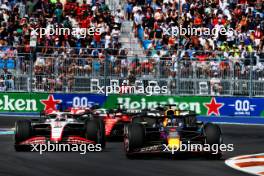 (L to R): Nico Hulkenberg (GER) Haas VF-23 and Max Verstappen (NLD) Red Bull Racing RB19 battle for position. 07.05.2023. Formula 1 World Championship, Rd 5, Miami Grand Prix, Miami, Florida, USA, Race Day.