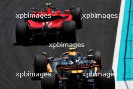 Carlos Sainz Jr (ESP) Ferrari SF-23 leads Lando Norris (GBR) McLaren MCL60. 06.05.2023. Formula 1 World Championship, Rd 5, Miami Grand Prix, Miami, Florida, USA, Qualifying Day.