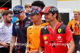(L to R): Max Verstappen (NLD) Red Bull Racing; Lando Norris (GBR) McLaren; and Carlos Sainz Jr (ESP) Ferrari, on the drivers' parade. 07.05.2023. Formula 1 World Championship, Rd 5, Miami Grand Prix, Miami, Florida, USA, Race Day.