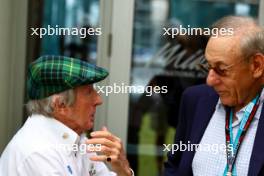 (L to R): Jackie Stewart (GBR) with Stephen Ross (USA) Related Companies Chairman, Miami Dolphins and Hard Rock Stadium Owner. 07.05.2023. Formula 1 World Championship, Rd 5, Miami Grand Prix, Miami, Florida, USA, Race Day.