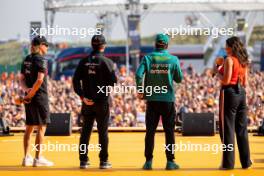 (L to R): Valtteri Bottas (FIN) Alfa Romeo F1 Team; Zhou Guanyu (CHN) Alfa Romeo F1 Team; Fernando Alonso (ESP) Aston Martin F1 Team; and Laura Winter (GBR) F1 Presenter, on the FanZone Stage. 25.08.2023. Formula 1 World Championship, Rd 14, Dutch Grand Prix, Zandvoort, Netherlands, Practice Day.