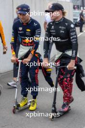 (L to R): Sergio Perez (MEX) Red Bull Racing with Valtteri Bottas (FIN) Alfa Romeo F1 Team. 25.08.2023. Formula 1 World Championship, Rd 14, Dutch Grand Prix, Zandvoort, Netherlands, Practice Day.
