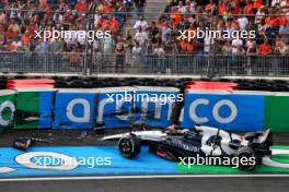 Daniel Ricciardo (AUS) AlphaTauri AT04 crashed in the second practice session. 25.08.2023. Formula 1 World Championship, Rd 14, Dutch Grand Prix, Zandvoort, Netherlands, Practice Day.