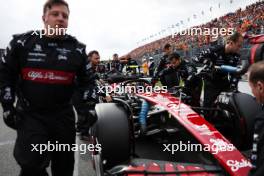 Zhou Guanyu (CHN) Alfa Romeo F1 Team C43 on the grid. 27.08.2023. Formula 1 World Championship, Rd 14, Dutch Grand Prix, Zandvoort, Netherlands, Race Day.